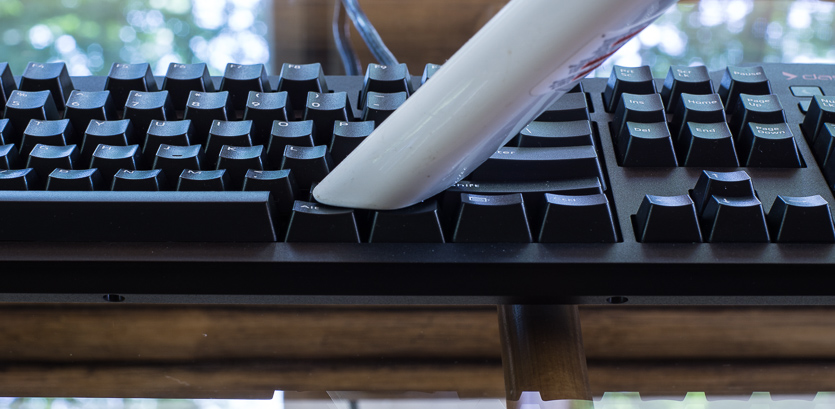 Clean Your Keyboard with Compressed Air